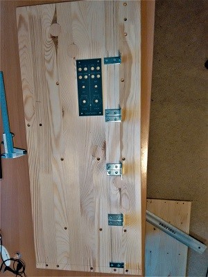 Angle brackets show on a side panel, but not yet screwed in