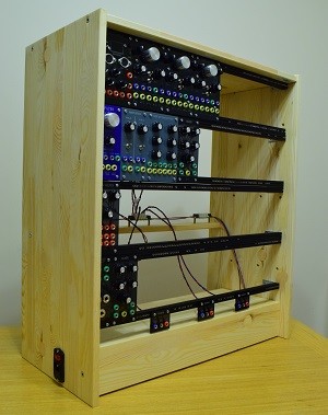 Glamour shot of the finished enclosure, populated with a some modules