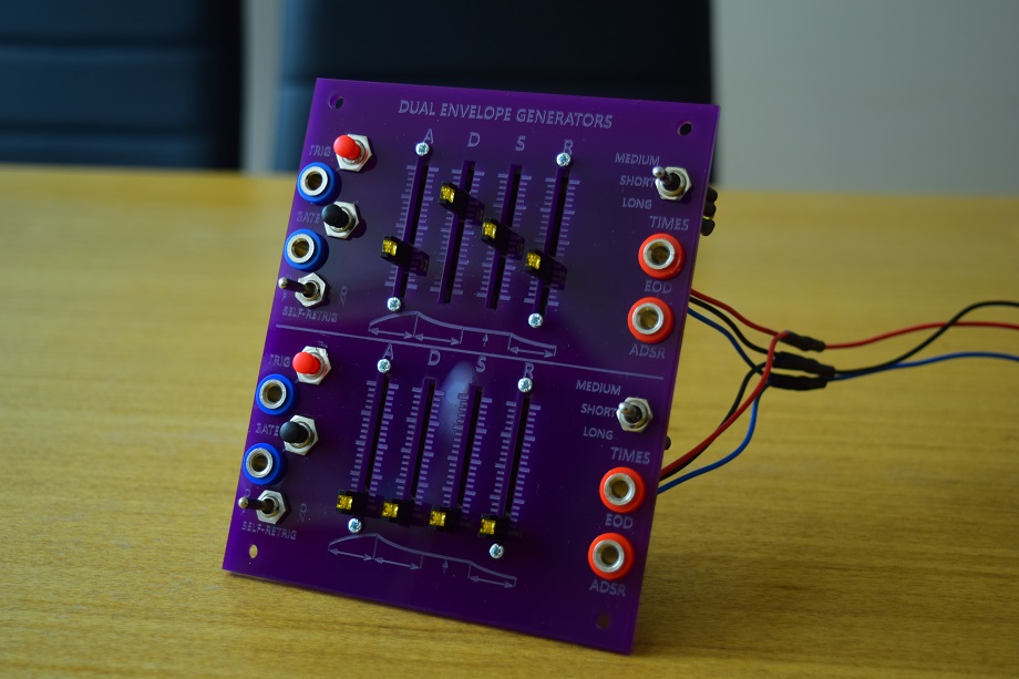 Fully assembled Dual envelope generator module sitting on a table