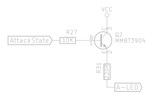 A 10K resistor connected to the base of an NPN transistor, with a 220 Ω resistor connected to its emitter.